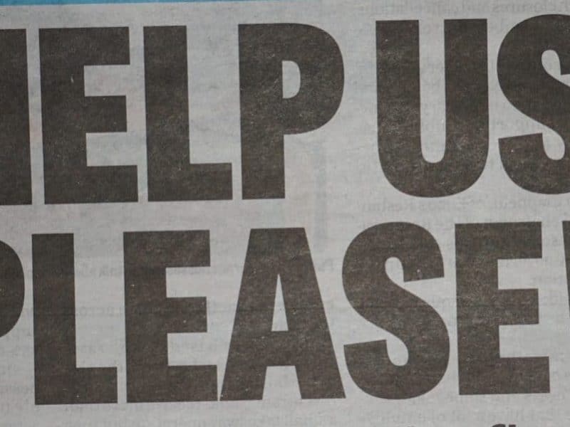 Help Us Please Headline from IOM Courier