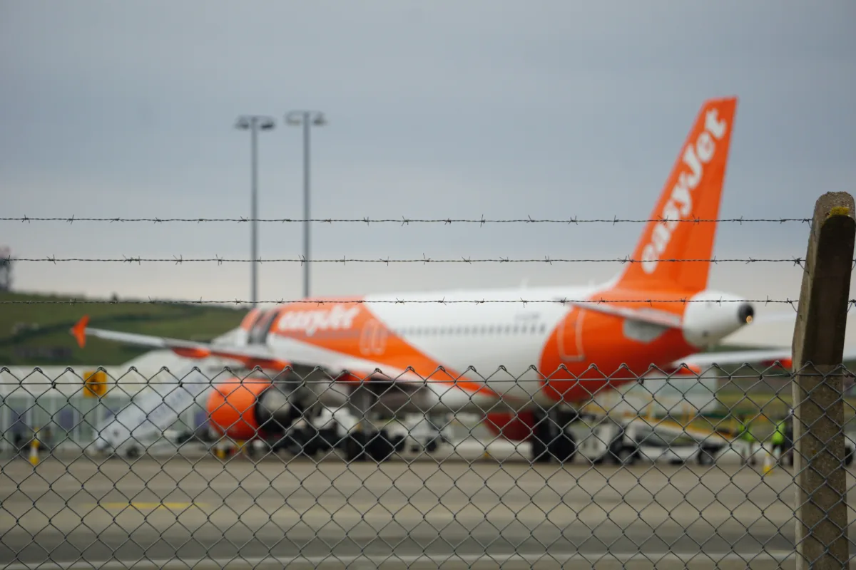 A slightly blurry image of a plane parked at IOM airport