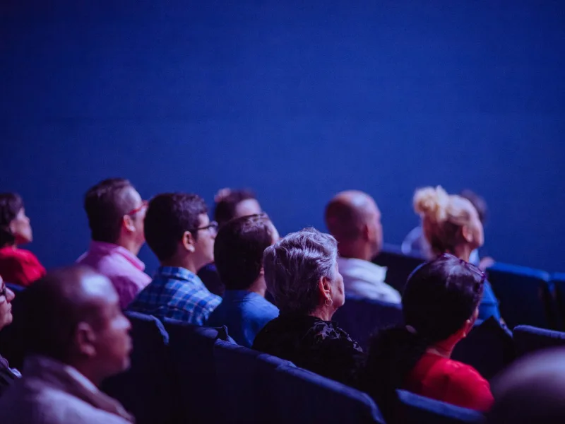 people sitting on gang chairs