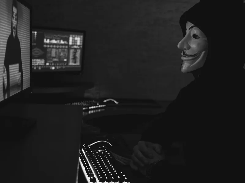 monochrome photo of two people having a video call